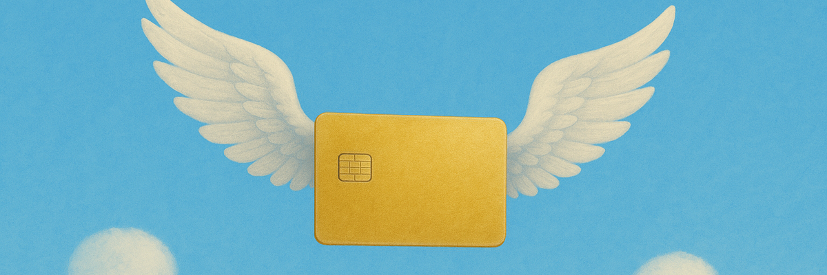 A gold credit card with wings in blue sky.