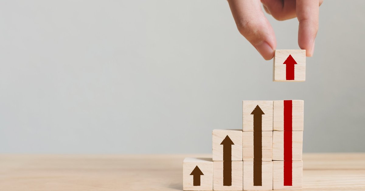 Stacks of blocks with arrows showing growth