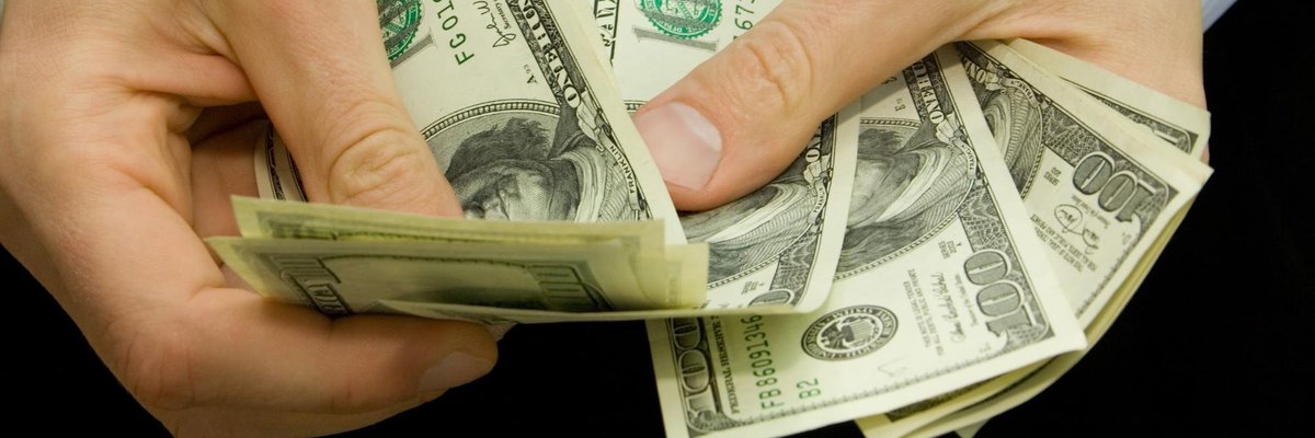 hands handling money