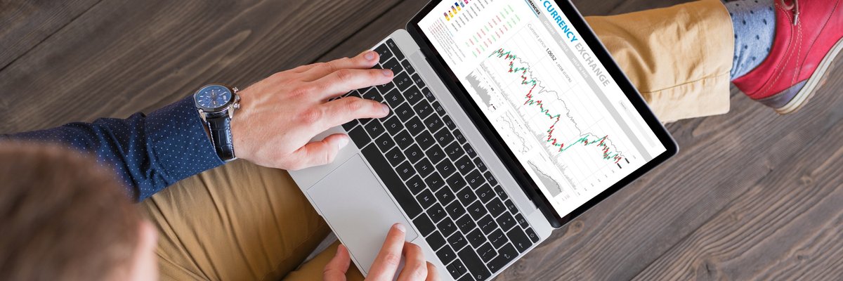 man online looking at stocks