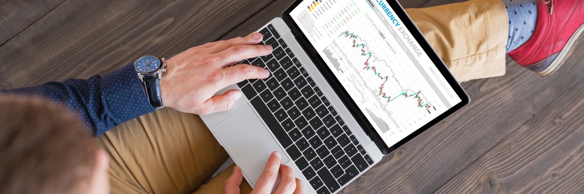 man online looking at stocks