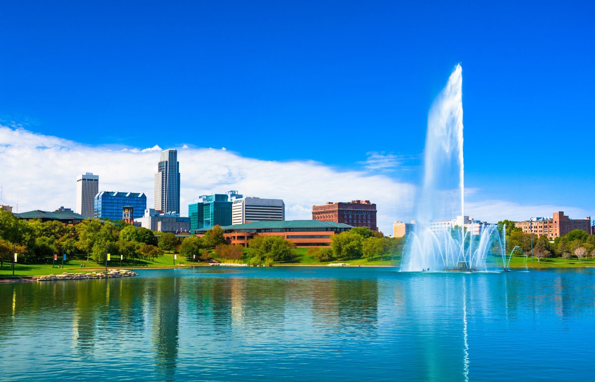 Downtown Omaha, Nebraska, with lake and fountain.