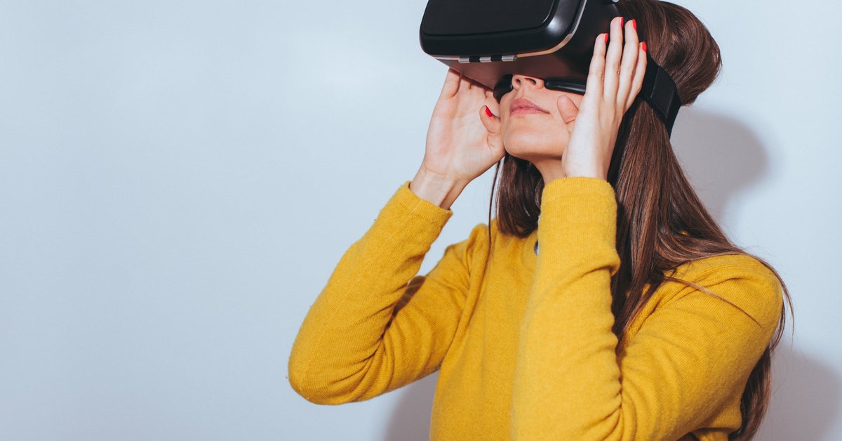 A person wearing virtual reality goggles.