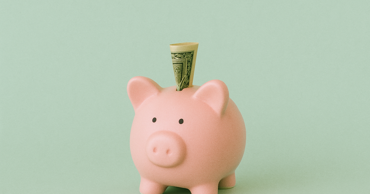A piggy bank with cash sticking out against light green background.