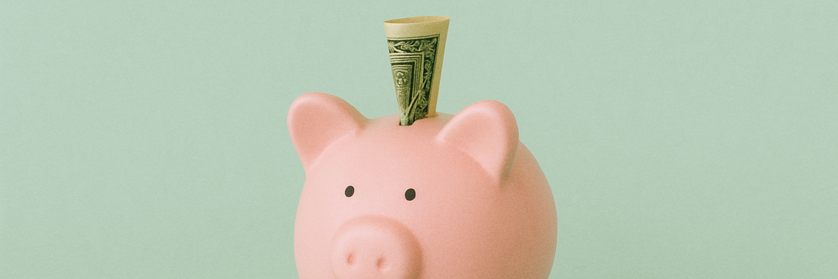 A piggy bank with cash sticking out against light green background.