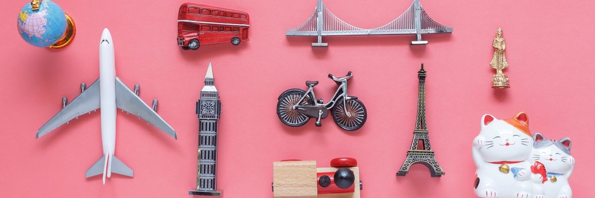 model plane, Big Ben, double-decker bus, and other travel icons