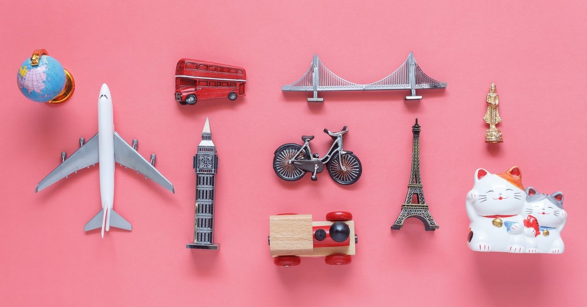 model plane, Big Ben, double-decker bus, and other travel icons