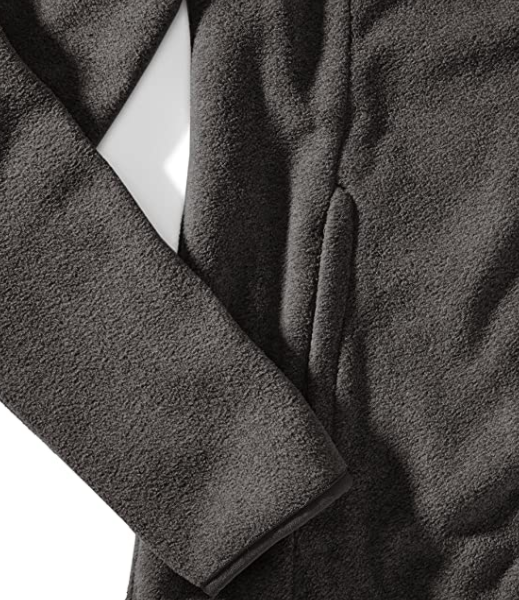 A photo of the sleeve and pocket seams of a women's fleece jacket.