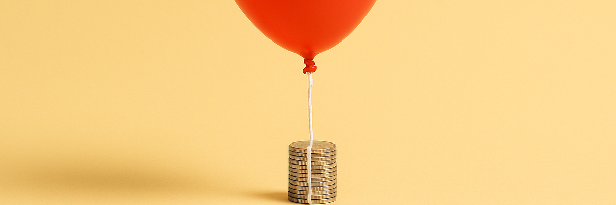 A red balloon tied to small stack of coins on yellow background.