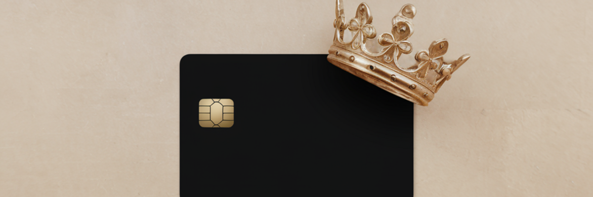 A generic black card with a gold crown situated on the top corner.