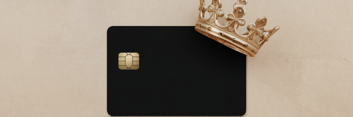 A generic black card with a gold crown situated on the top corner.