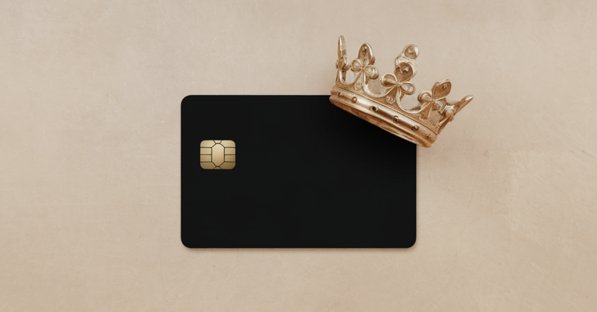 A generic black card with a gold crown situated on the top corner.
