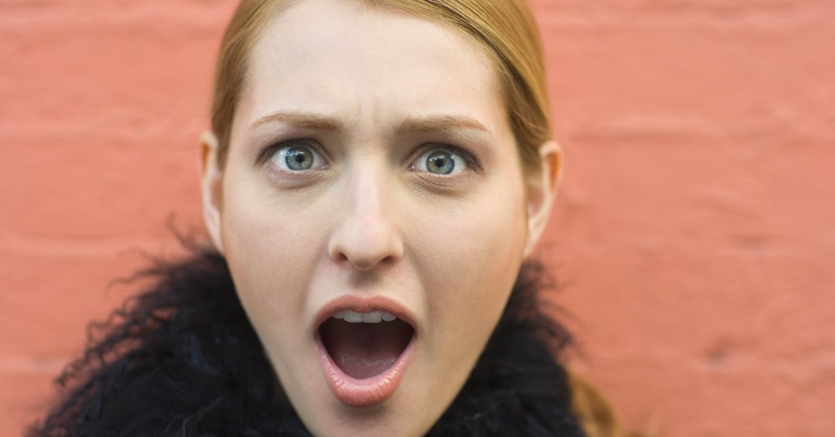 A woman with a shocked expression on her face.