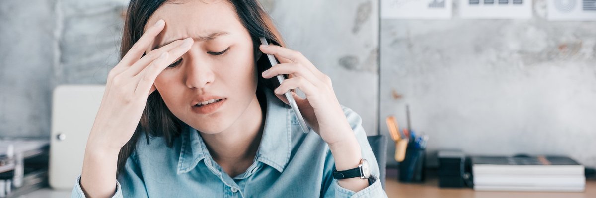 Stressed woman on the phone