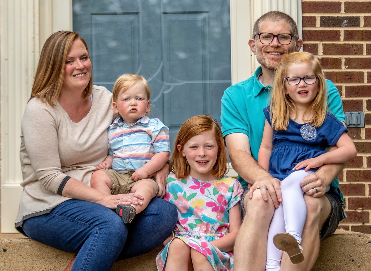 A Fair family portrait taken outdoors.