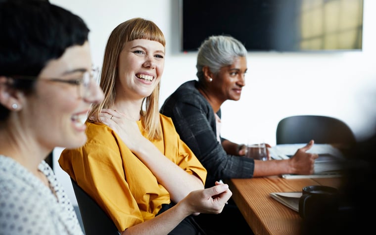 Diverse group of employees in an office setting.