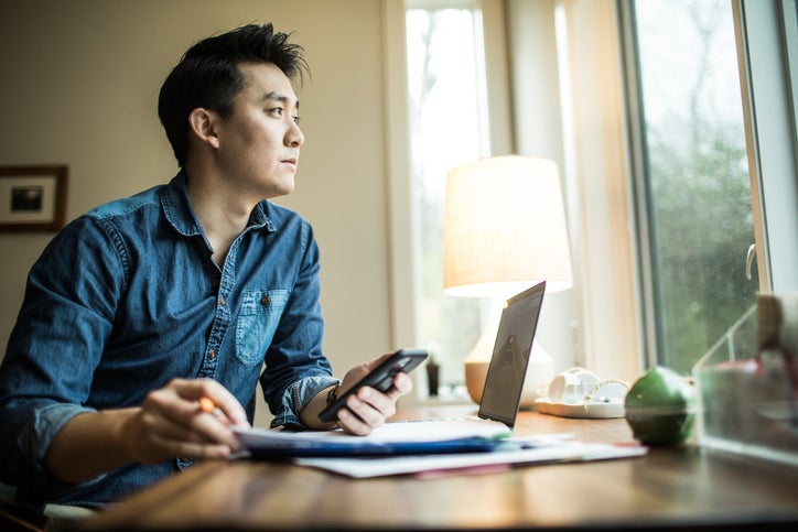 A man shopping at home in a savings account.