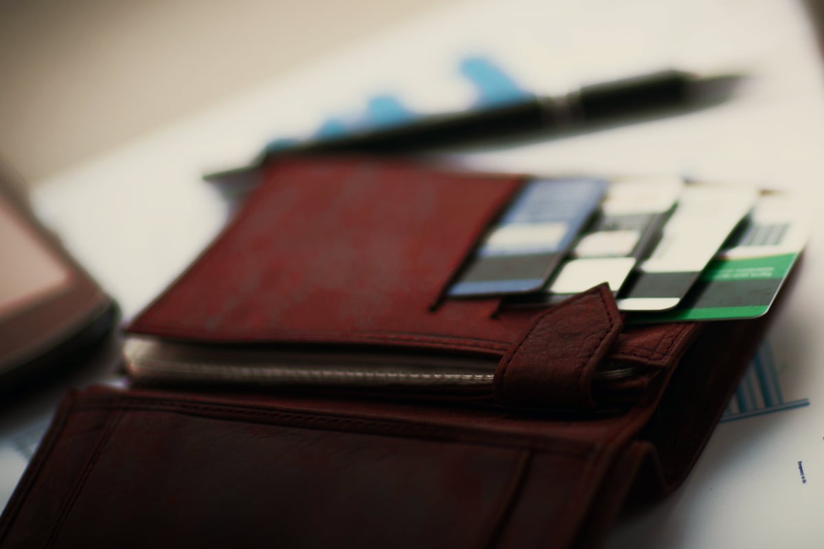Wallet sitting open showing credit cards