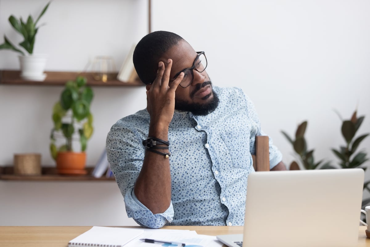 Man With Glasses Worrying
