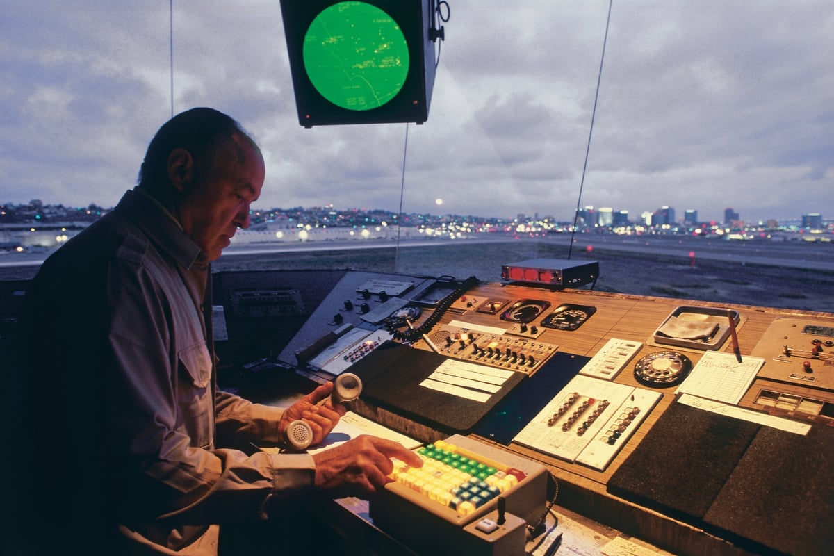 Man working in air traffic control tower.