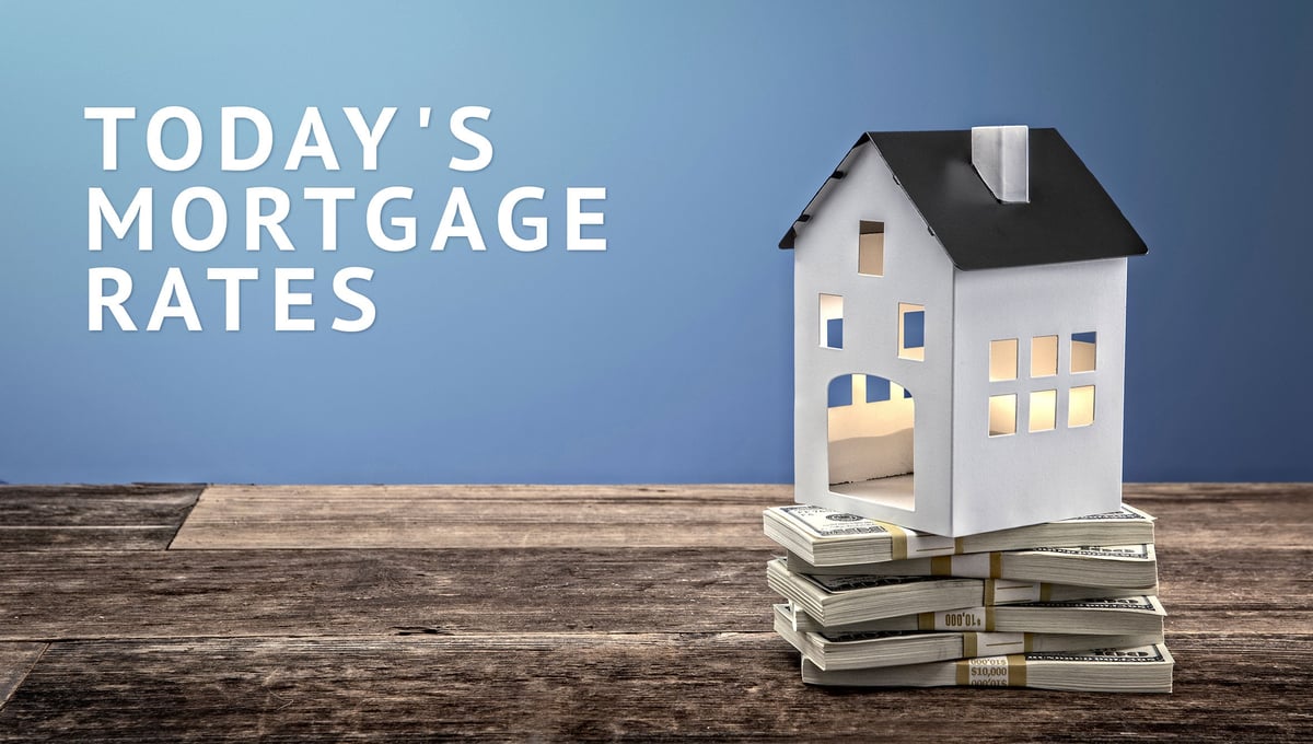 Hollow model home on top of stacks of cash with Today's Mortgage Rates graphic.