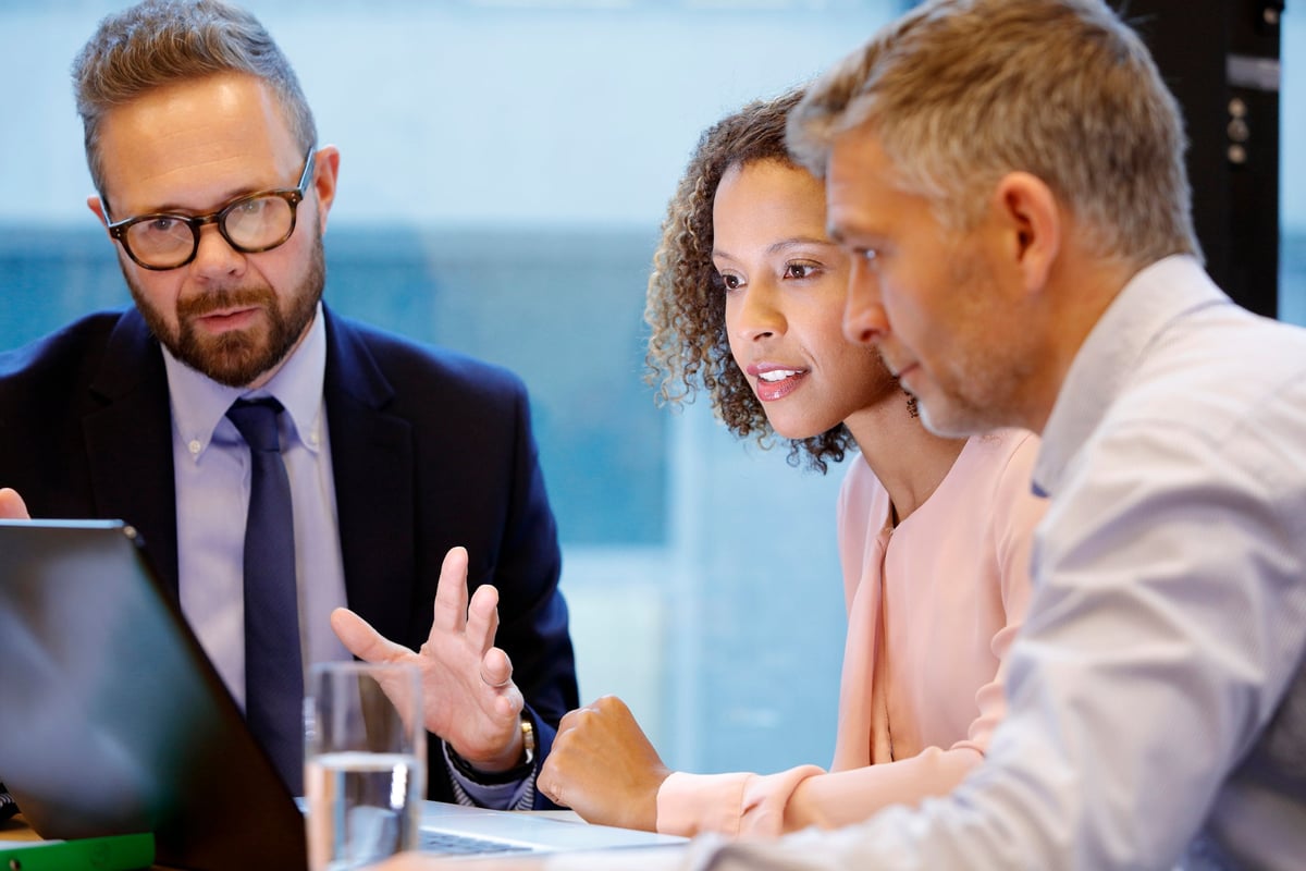 Professional male meeting with couple.