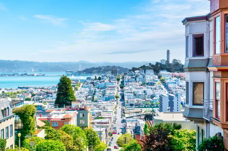 San Francisco apartments overlooking the hills and the Bay on a sunny day.
