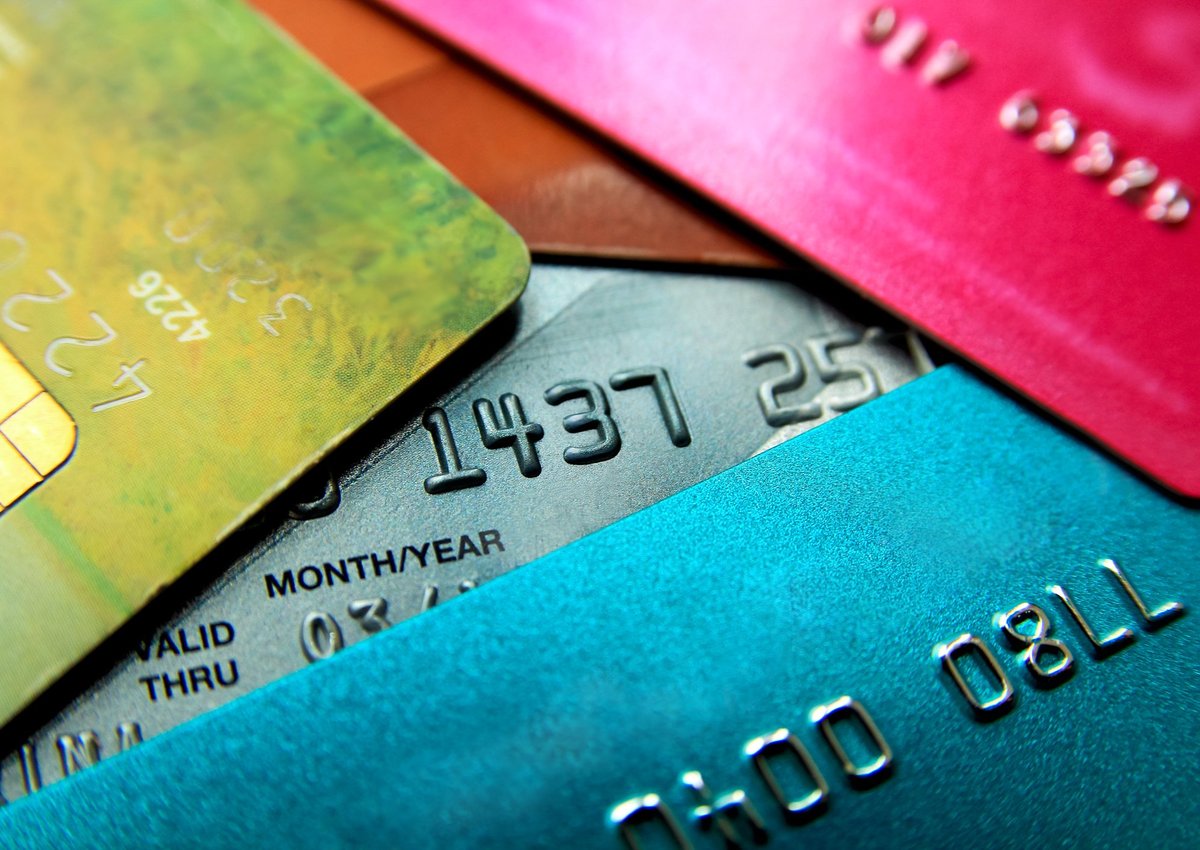 Pile of colorful credit cards.
