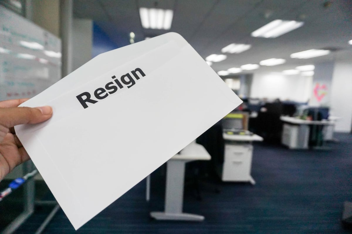 envelope with the word resign printed on it