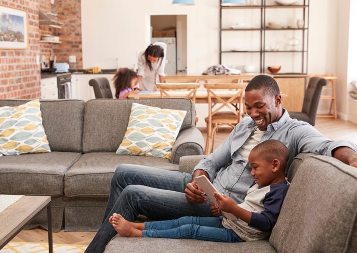 A family in an open floor plan home.