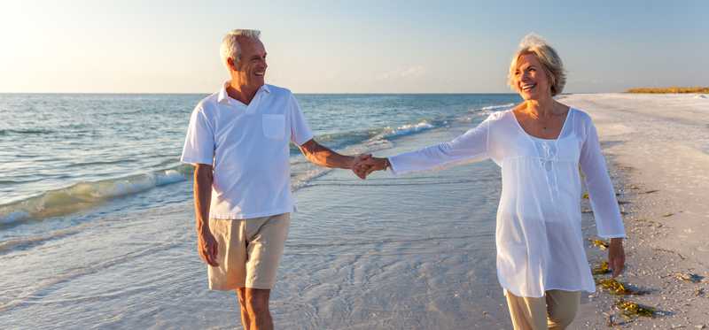 Retirees relaxing on the beach