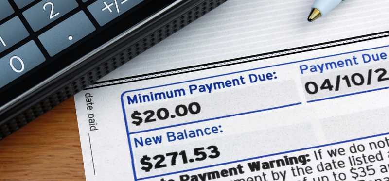 A credit card bill with minimum payment highlighted.