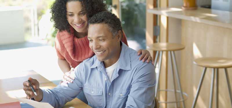 Two people reviewing finances.