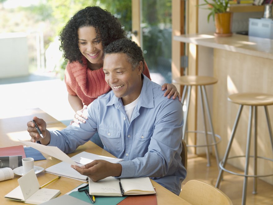 Two people reviewing finances.