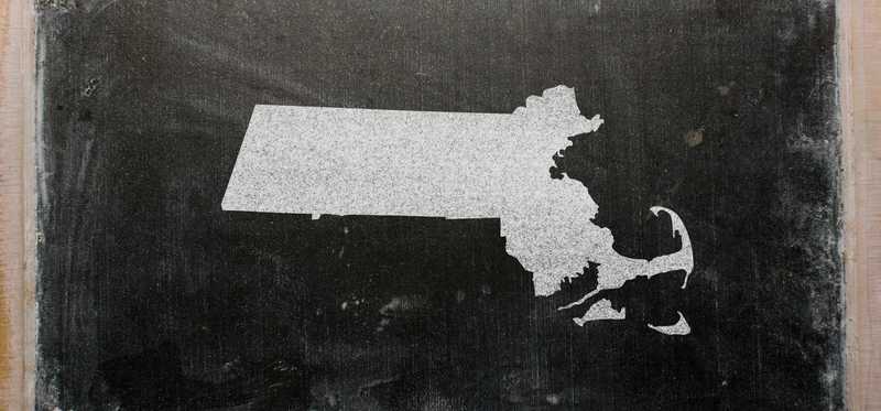 Chalk outline of the state of Massachusetts on a chalkboard.