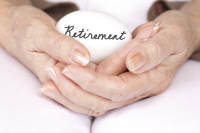 Hands cradling egg with the word Retirement written on it.
