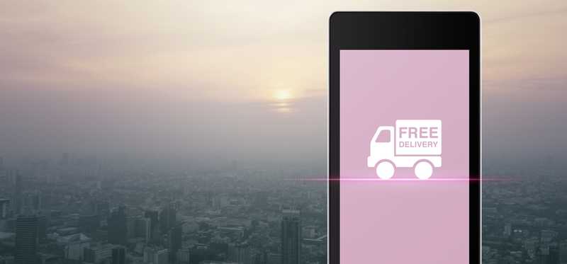 Smartphone showing icon saying Free Delivery