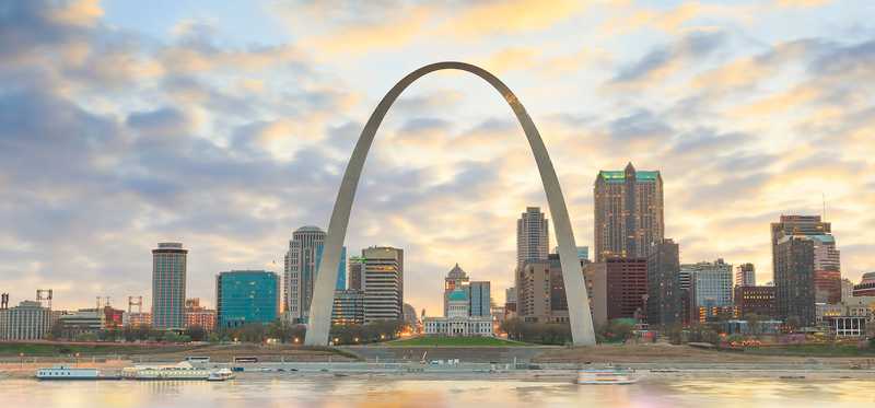 The St. Louis, Missouri, arch and the cityscape behind it.