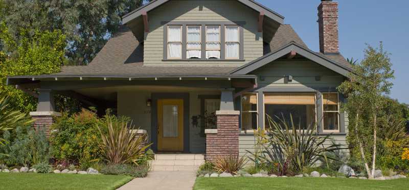 A two-story home in a suburban neighborhood.