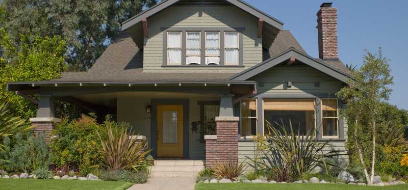 A two story home in a suburban neighborhood.