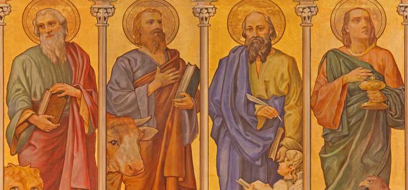 An old piece of artwork featuring four saints.
