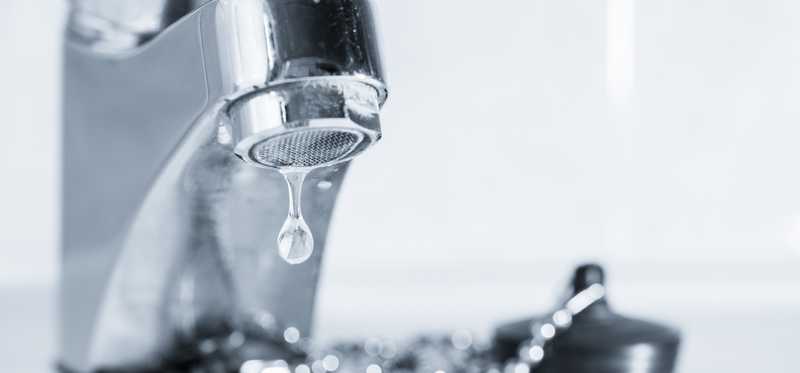 Dripping water faucet.