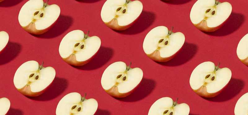 Rows of apples cut in half