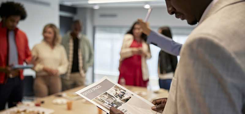 People at a table looking at documents.
