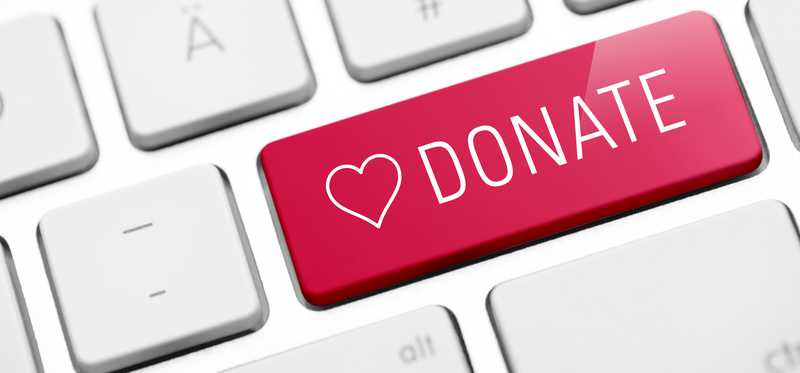 A keyboard with a red Donate button