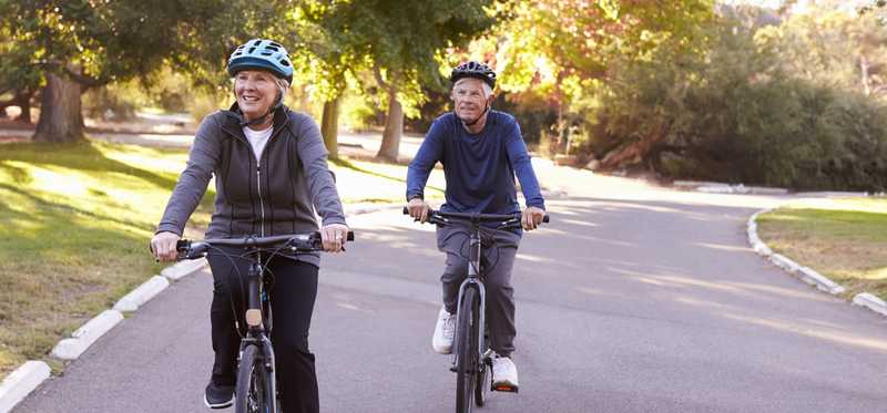 Two people on a bike ride.