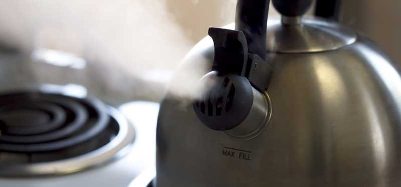 A steaming tea kettle.