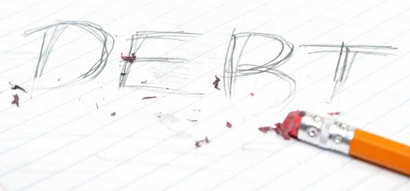 The word Debt being erased.