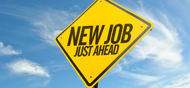 Road sign reading New Job Just Ahead