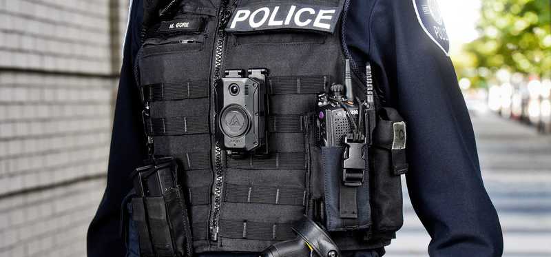 Police officer torso in tactical gear.
